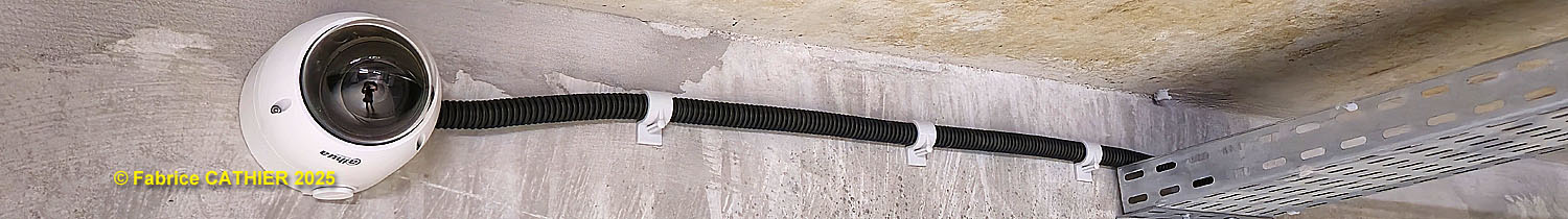 Caméra de vidéosurveillance installée dans un parking sous-sol de copropriété